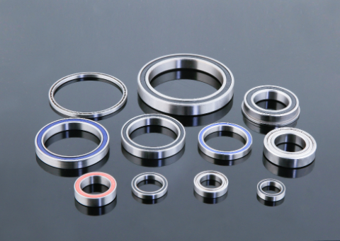 Single row deep groove ball bearings aligned for packaging or inspection
