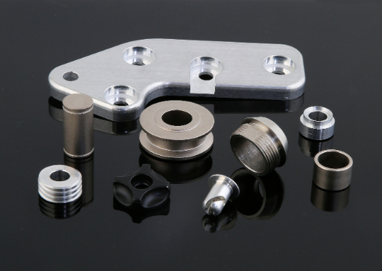Machined bearing parts and CNC-manufactured metal components
